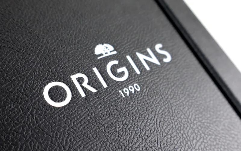 Close-up of a textured black surface featuring the word 