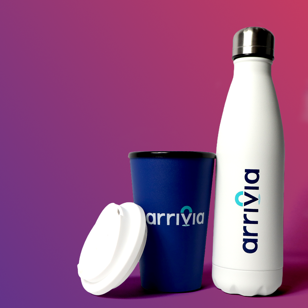 A blue reusable cup with a black lid and a white insulated water bottle, both featuring the logo 