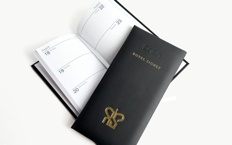 A black 2025 planner titled 