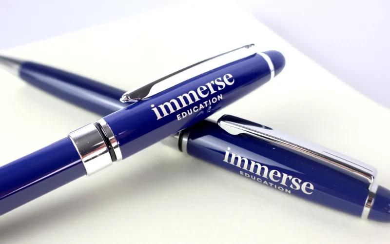 A close-up image of blue pens with 