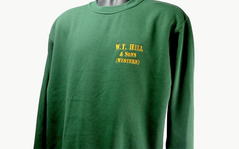 A green long-sleeve shirt with 