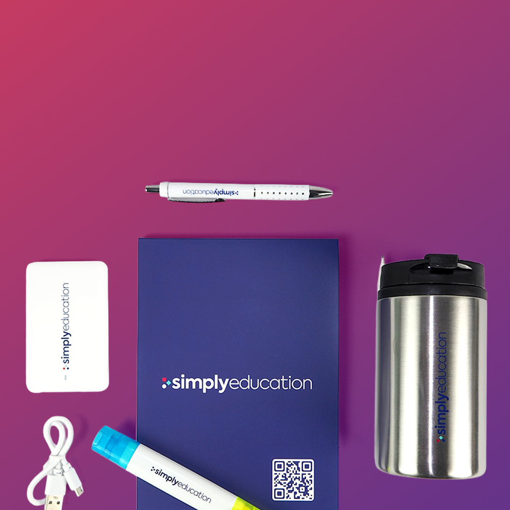 A flat lay of educational branding items, including a notebook, a pen, a USB cable, a highlighter, a business card, and a stainless steel mug, all featuring the 