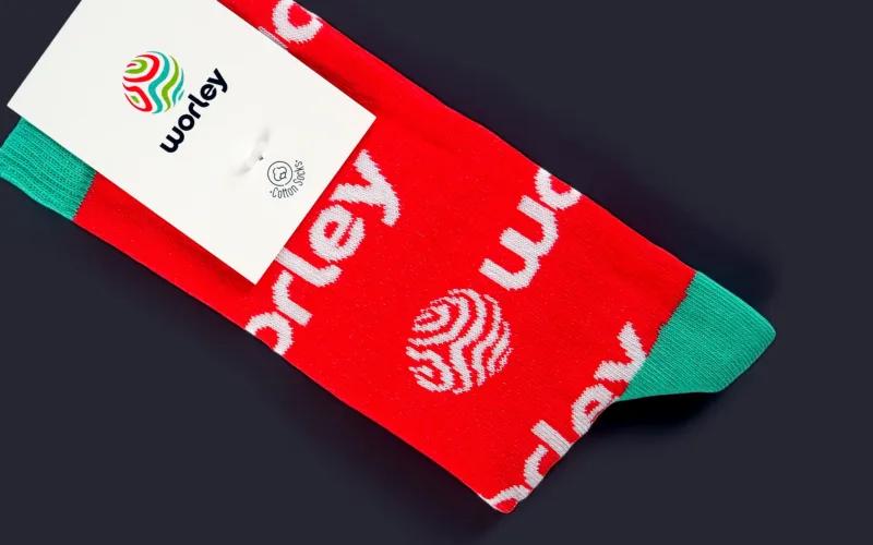 Red socks with white text that reads 