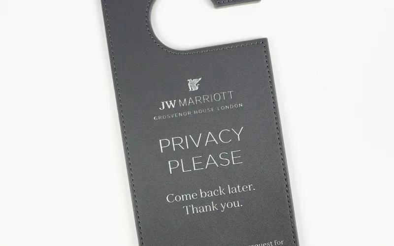 A door hanger that reads 