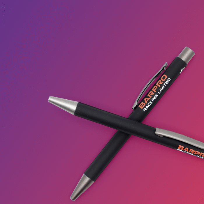 Two black pens with silver tips, positioned diagonally across each other, against a gradient purple background.
